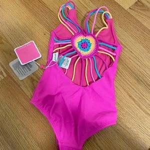 New with tags!
Lil Girls size 6 Mona One-Piece Heart Crochet Swimsuit Magenta